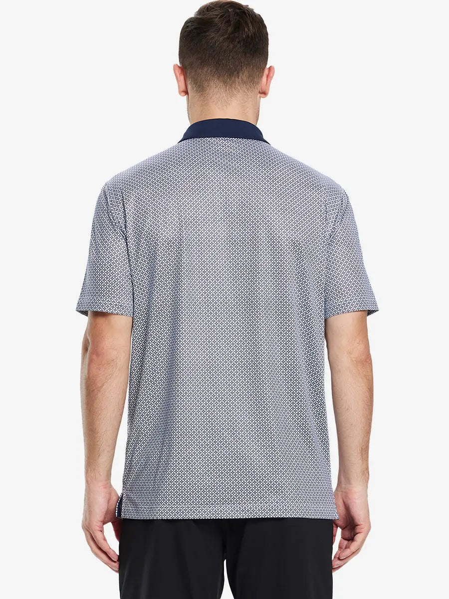 From the back, the model shows the back design of the WHITE NAVY INTERLINK  Polo shirt, clearly showing the shape and cut of the garment