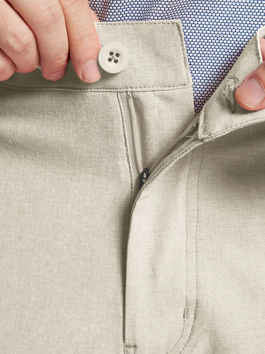 DARK BLUE 7 Inch Heather Performance Golf Shorts close-up of waistband and button detail