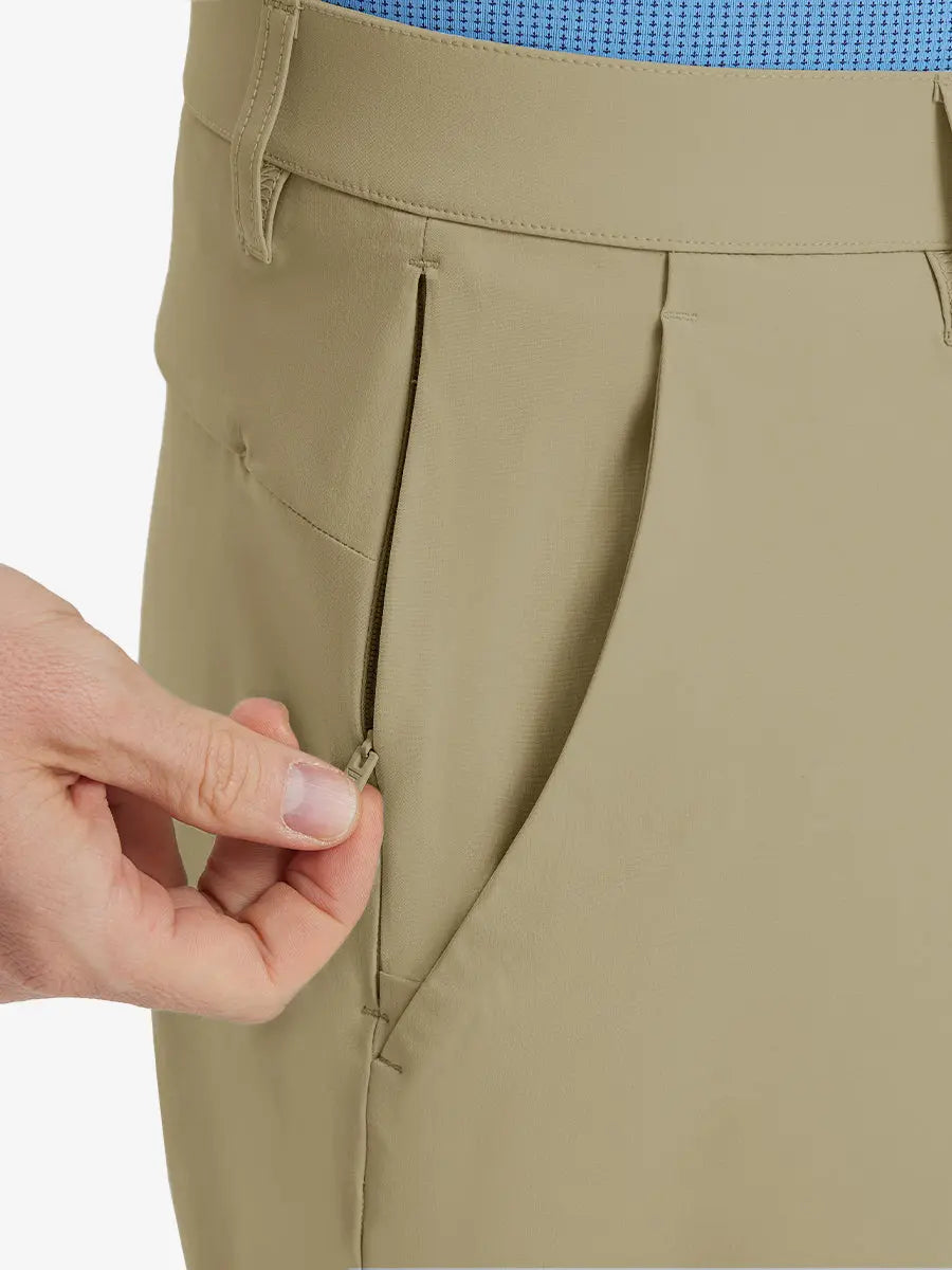 Close-up of right front pocket with zipper being opened on Player Fit Versatile Solid Shorts 9 Inch – KHAKI