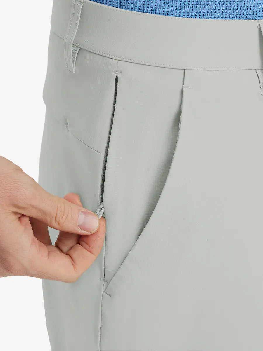Close-up of right front pocket with zipper being opened on Player Fit Versatile Solid Shorts 9 Inch – GLACIER GREY