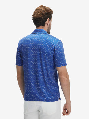 Back half-body view of model wearing the blue golf swing 4 way stretch print collared polo shirt, highlighting the rear silhouette