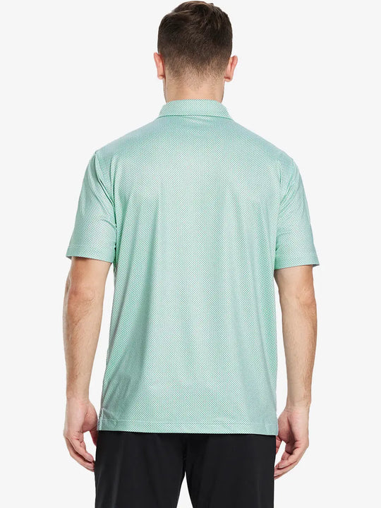Back view of the model showcasing the green plant pattern polo, highlighting its fresh design and dynamic style.