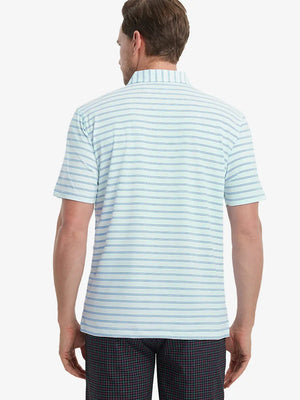 Back view of model in Light Blue Cobalt Stripe Performance Stripe Golf Shirt