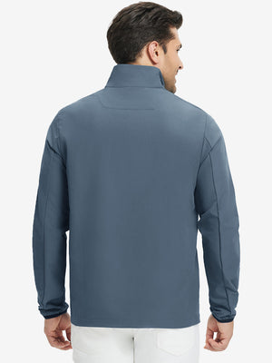 Back upper body view of the misty blue mock neck golf pullover, model turns head for relaxed pose.