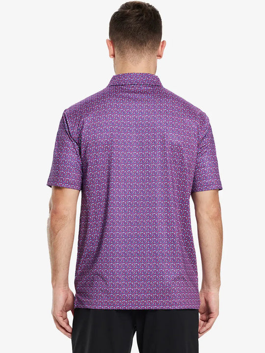 Back view of the model wearing the magenta geometric pattern polo, showcasing modern design and vibrant energy.