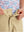Detail: waistband of khaki boys lightweight dry fit flat front golf shorts