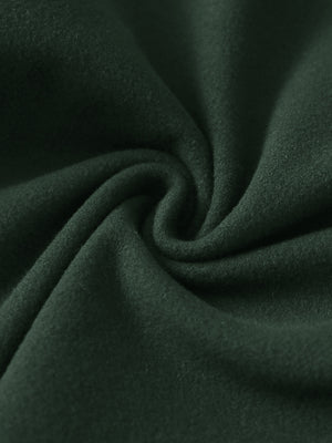 Close-up of the fabric of women's stretch fleece lined water resistant joggers in forest green, highlighting the fleece lining.