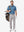 Front full body shot of model exercising in light blue  ultra-comfort slim fit roma knit polo shirts
