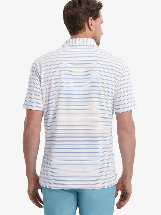 Back view of model in Light Pink Cobalt Stripe Performance Stripe Golf Shirt