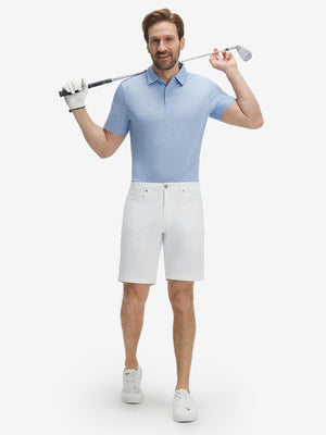Full-body shot of model holding a golf club in light blue ultra-light quick dry moisture wicking collared polo shirt