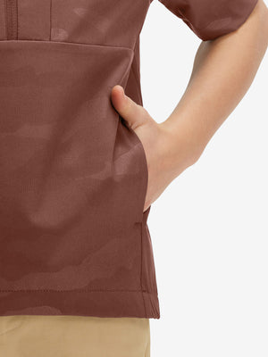 Detail shot of pocket on coffee brown water-resistant short sleeve q-zip hoodie for boys