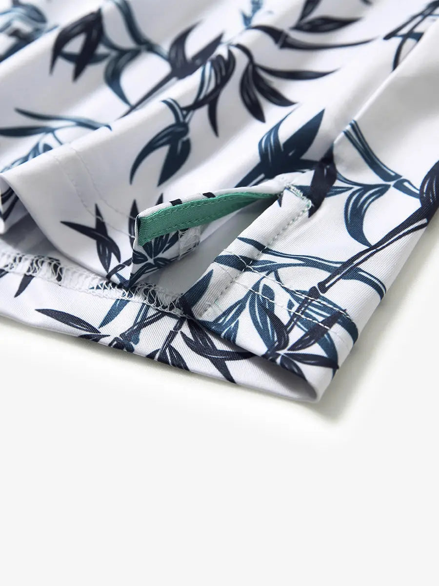 Hem slit detail of BLUE BAMBOO Performance Quick Dry Print Golf Polo highlighting stitching and finish