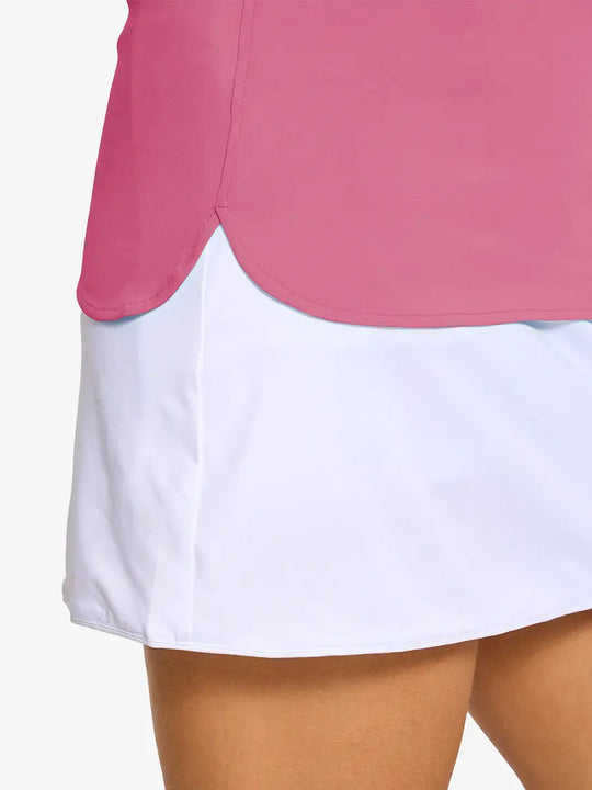 Detail shot of side hem opening on PINK LEMONADE Women's Performance Solid Polo