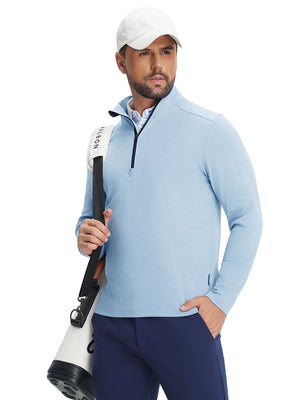 Model wearing two tone pique cotton blend q-zip in light blue, hand in pocket with tennis bag