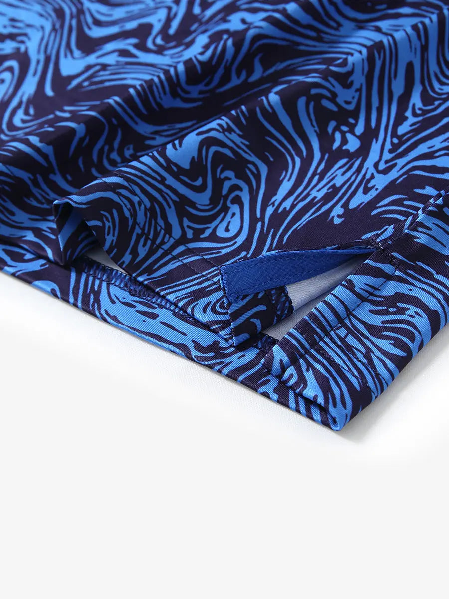 The section showcases the corner opening design of the navy blue swirl patterned model polo shirt, exquisite workmanship and dynamic fabric highlights the golf sports style.