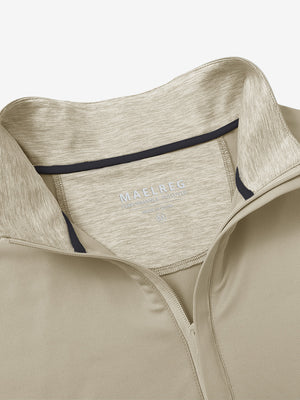 Collar detail of Stretch solid fleece quarter-zip vest with clean zip and subtle light khaki tone