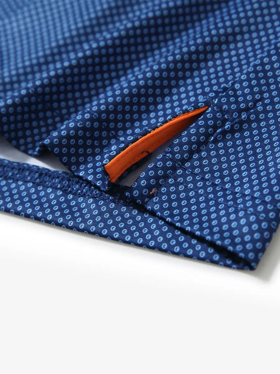 Hem slit detail of BLUE CIRCLE Performance Quick Dry Print Golf Polo highlighting stitching and finish