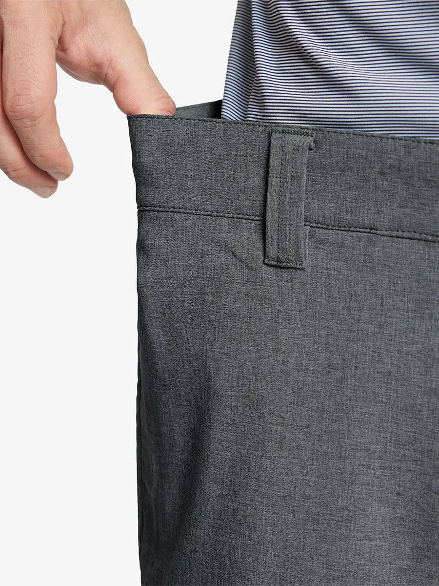 DARK GREY 7 Inch Heather Performance Golf Shorts close-up of waistband being stretched to show elasticity