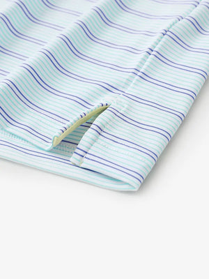 Close-up of side hem slit on Mint Green Cobalt Stripe Performance Stripe Golf Shirt