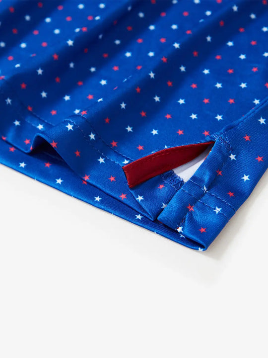 The navy blue Stars and Stripes patterned model polo shirt has corner opening details for a patriotic and modern sporty look, perfect for golf course wear.