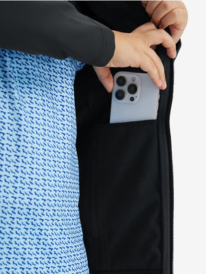 Close-up of the front side pocket detail on kids soft lightweight fleece lined jacket in black, showing quality stitching.