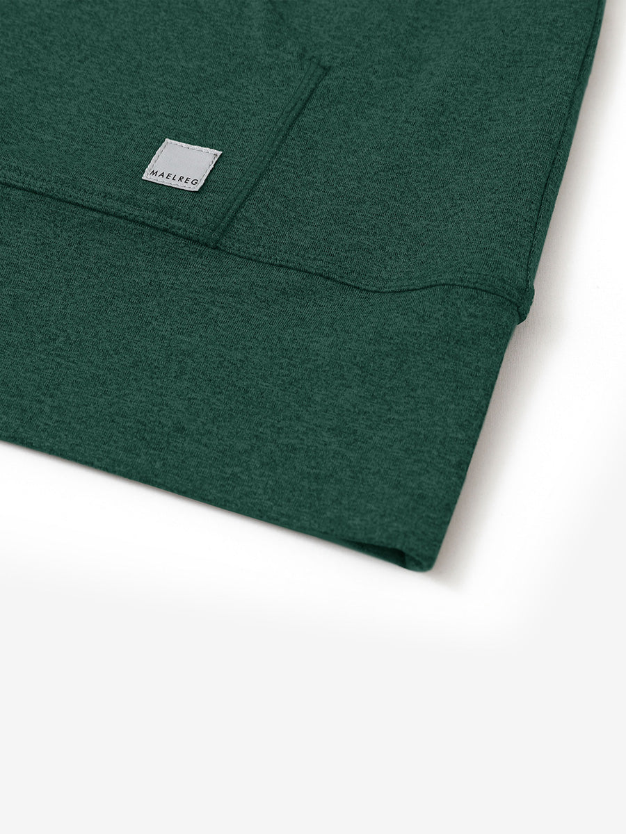 Hemline detail of the Quarter Zip Hoodie in Turquoise Heather, showing neat edges and fine craftsmanship.