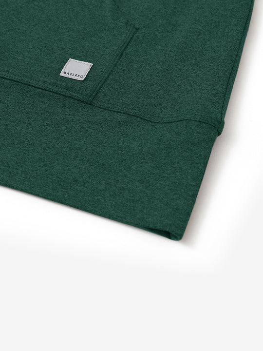 Hemline detail of the Quarter Zip Hoodie in Turquoise Heather, showing neat edges and fine craftsmanship.