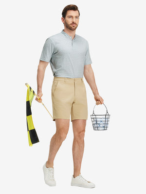 Full front: model in gray geometric stretch printed collarless henley golf shirts holding golf ball.