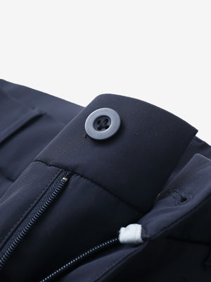 Waist detail of quick dry casual dress pants in navy, featuring button and zipper design.