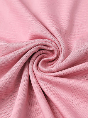 Close-up of carmine modern texture stylish polo fabric showing surface detail.