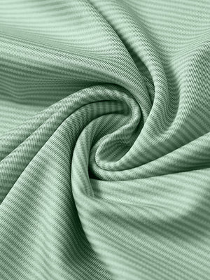 Close-up of beryl green melange pinstripe quarter zip pullover fabric showing fine lines and soft knit texture.