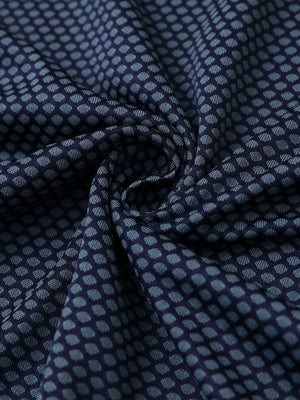 Close-up of grey navy your favorite jacquard polo fabric showing textured knit and soft finish.