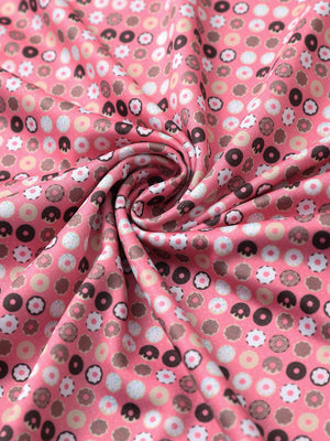 Texture detail of Performance jersey print polo with soft stretch in pink donut
