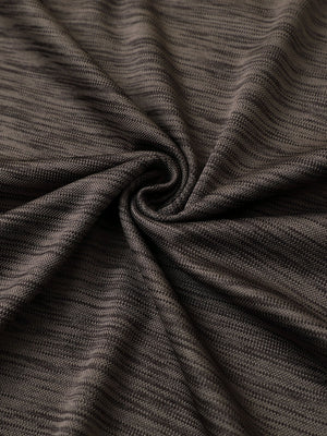 Close-up of dark brown heather texture polo fabric showing soft surface.