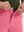Detail view of the zipper on the peach pink stretch soft flat front dress golf shorts, highlighting secure closure