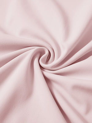 Fabric detail of youth long sleeve hoodied with kangaroo pocket, soft knit texture with light pink tone