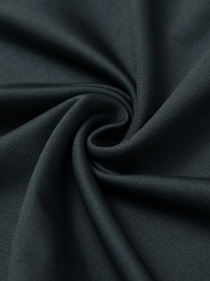 Fabric close-up of Stretch solid fleece quarter-zip vest with soft feel and dark grey detail
