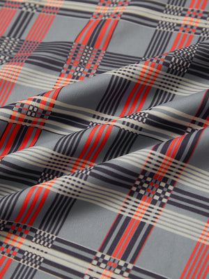 Full print lightweight quarter zip pullover, close-up of smooth fabric with detailed print in red/black/white plaid