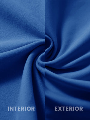 Close-up of the inner and outer fabric of kids soft lightweight fleece lined jacket in klein blue.