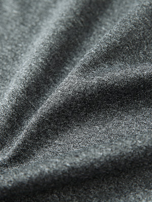 Close-up fabric detail of moisture wicking quarter zip pullover, smooth knit and quick-dry feel in grey melange