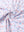 Close-up of beverage glass performance jersey print polo fabric texture.
