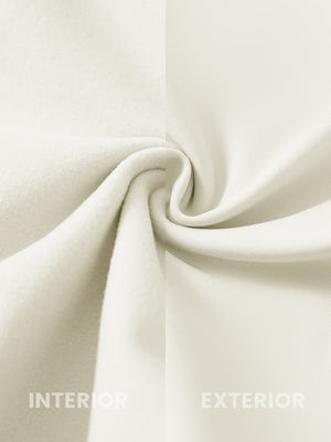 Close-up of the inner and outer fabric of women's stretch fleece lined water resistant joggers in beige, showing fleece lining and exterior.