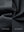 Close-up fabric detail of water-resistant fleece lined pants, soft inner lining and durable dark grey exterior