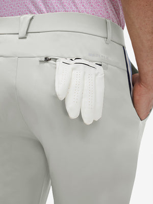 Detail view of back pocket on silver gray breathable casual slacks with 4 pockets