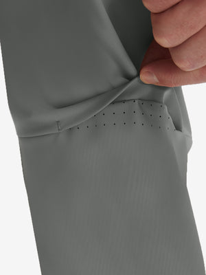 Detail view of design on iron grey flat front golf joggers pants with belt loops