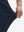 Detail view of pants elasticity on navy flat front golf joggers pants with belt loops