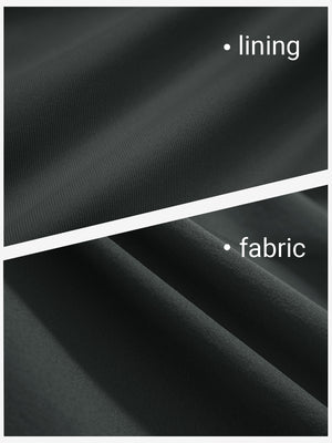 Close-up texture of dark grey women's gym golf shorts with liner pocket fabric showing detailed outer and inner lining material.