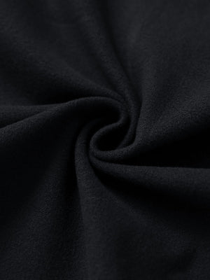 Fabric close-up of black women's water-resistant stretch fleece lined jacket, soft stretch fabric with fleece lining.
