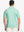 Rear half-body shot showing fit of ICE GREEN Performance Ananas Jacquard Polo
