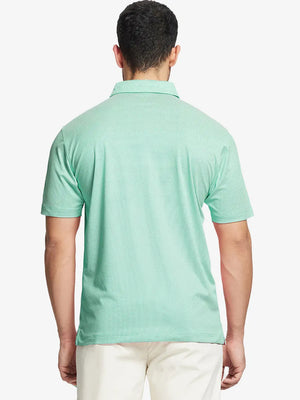 Rear half-body shot showing fit of ICE GREEN Performance Ananas Jacquard Polo